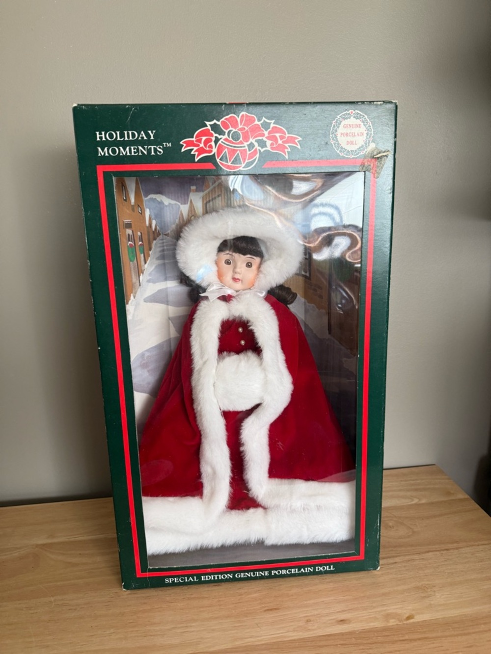 Porcelain Doll in Red and White Cape